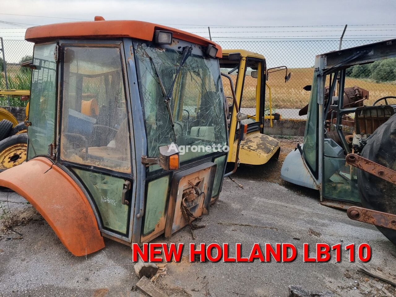 cabina New Holland LB110 per trattore cingolato per elementi